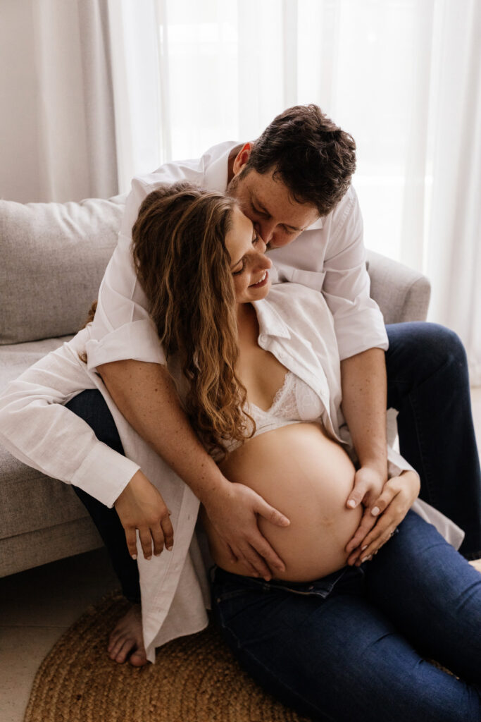 The couple radiates joy as they celebrate the upcoming arrival of their baby during the maternity shoot in Abu Dhabi.